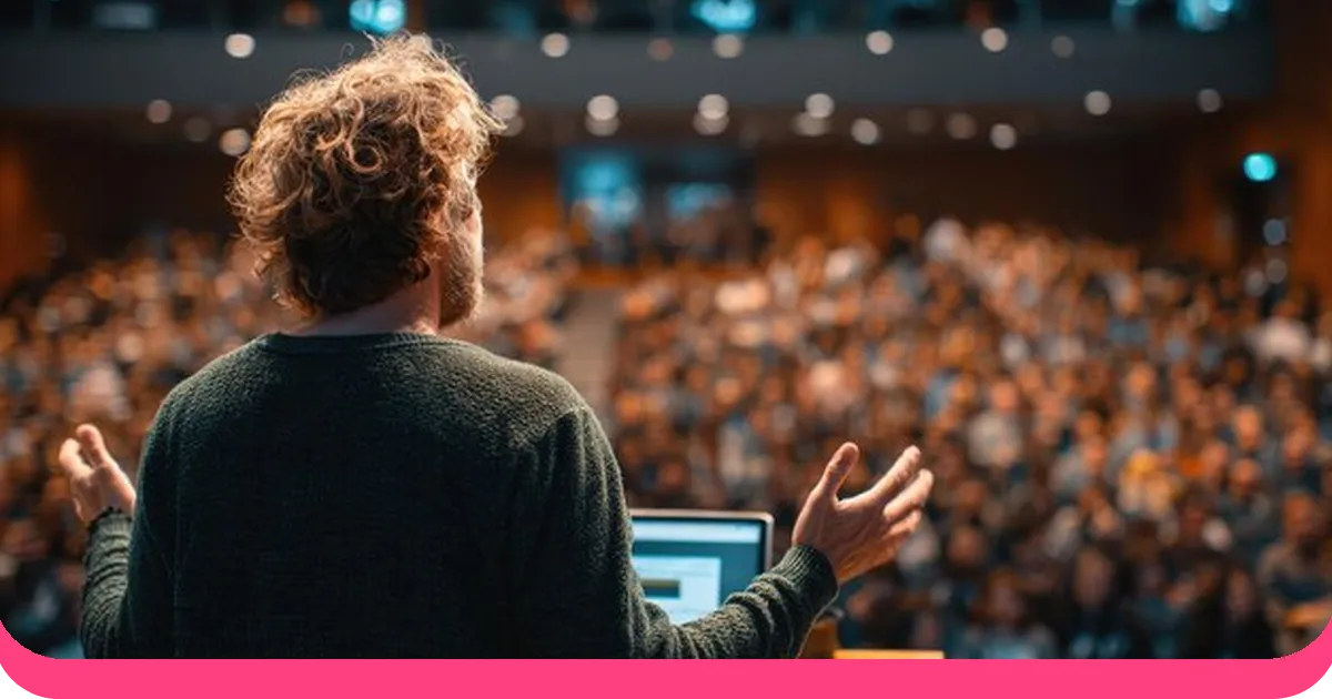 Confident speaker presenting to a live audience