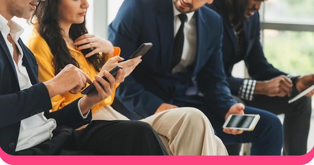 Diverse business audience using phones during a presentation Q&A session