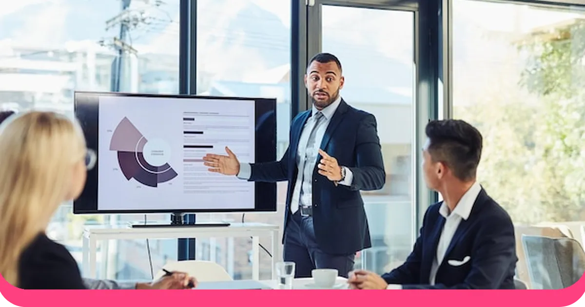 Businessman presenting data statistics in a boardroom to colleagues