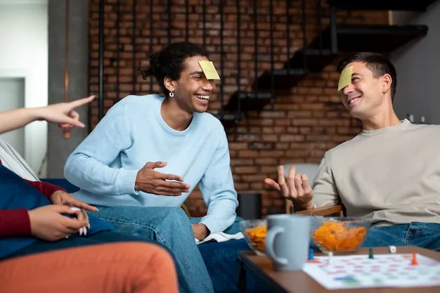 Colleagues laughing together during a light team game