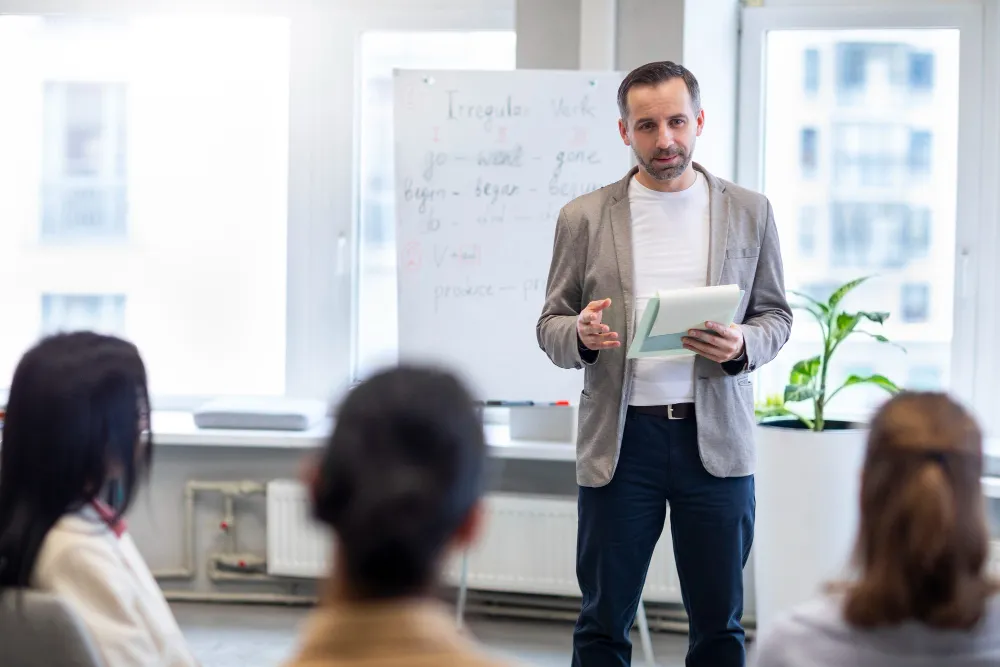 A trainer in a professional meeting
