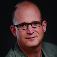 A portrait image of the author